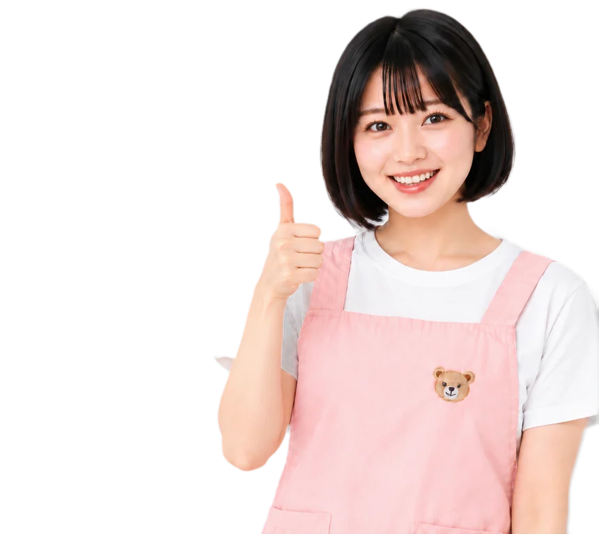 満面の笑顔で親指を立てる保育士