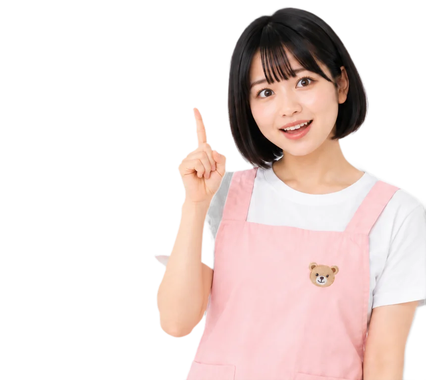 人差し指を立てて「なるほど」という表情の保育士